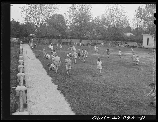 San Augustine, Texas. Easter egg hunt on the school lawn on the last day before Easter vacation