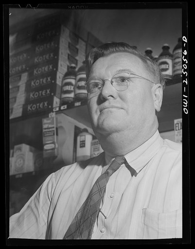 San Augustine, Texas. Clyde Smith in his grocery store. Mr. Smith is a member of the town council
