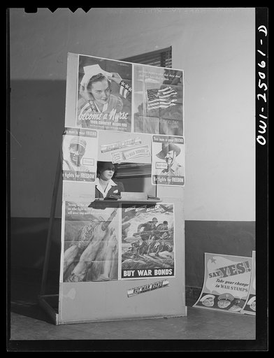 San Augustine, Texas. Booth set up in the lobby of the bank for the sale of war bonds and stamps