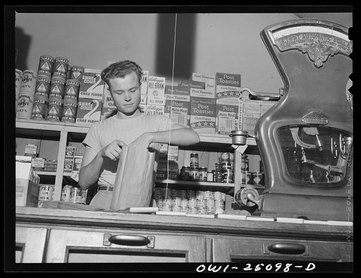 San Augustine, Texas. Grocer's boy just turned eighteen. He had his first physical examination for induction into the Army this morning