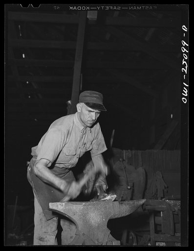 Untitled photo, possibly related to: San Augustine, Texas. Blacksmith