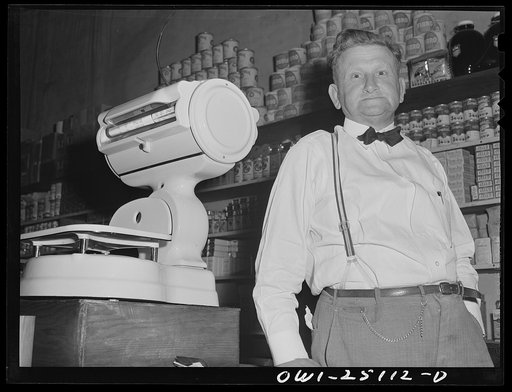 San Augustine, Texas. Jack Mathews, owner of a grocery and feed store