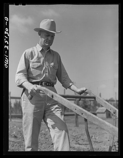 Untitled photo, possibly related to: San Augustine, Texas. Jim Halberd [i.e., Halbert], the sheriff, working in his garden
