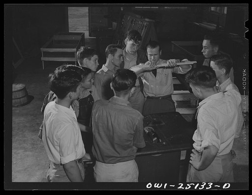 San Augustine, Texas. High school class learning how to operate dado attachment on a saw