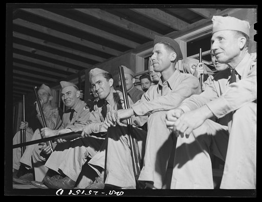 San Augustine, Texas. The members of the Texas Defense Guard assembled in the high school auditorium