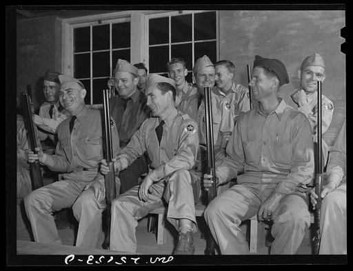 San Augustine, Texas. The members of the Texas Defense Guard assembled in the high school auditorium