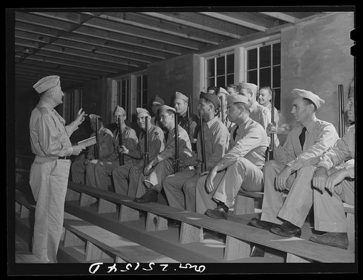 San Augustine, Texas. Lieutenant Gary, local commander of the Texas Defense Guard, lecturing on military courtesy. Lieutenant Gary is the county surveyor