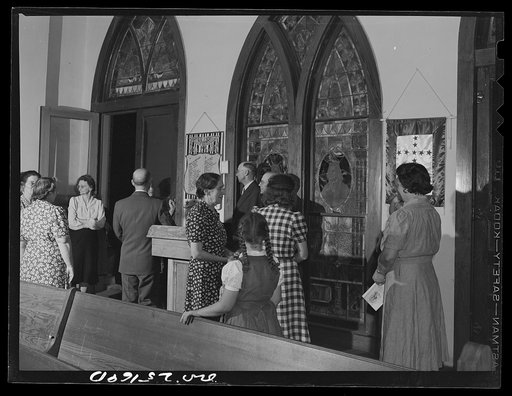 San Augustine, Texas. People talking in the back of the Methodist church after the Good Friday evening services