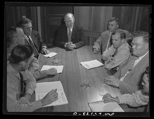 San Augustine, Texas. A meeting of the town council to discuss buying a new water tank to replace the one which was destroyed by the March tornado. Left to right around the table: Troy Mitchell, city manager; J.W. Ritchie, tinner; H.D. Clark, department store owner; Mayor Alonzo Rushing, druggist; M