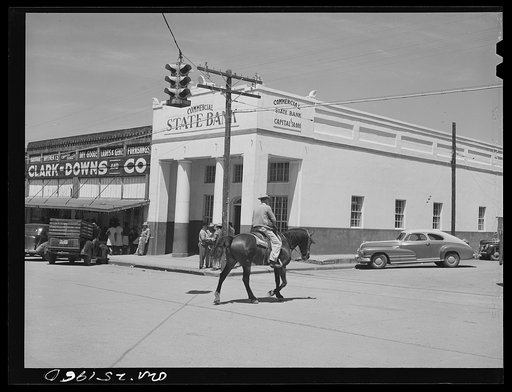 San Augustine, Texas. A man going to the livestock auction