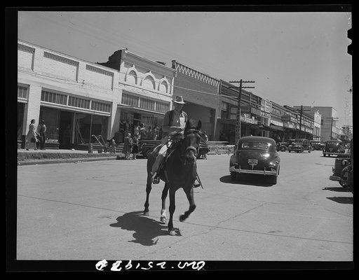 San Augustine, Texas. A man going to the livestock auction