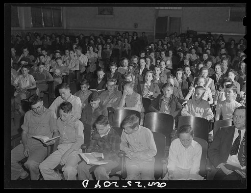 San Augustine, Texas. A high school student body singing at a general assembly