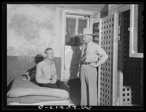 San Augustine, Texas. Sheriff Halberd [i.e., Halbert] talking with a prisoner in the county jail