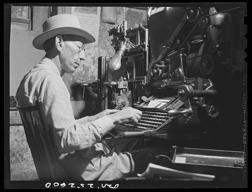 San Augustine, Texas. W.F. Hayes, editor of the San Augustine Tribune, operating a linotype machine. Since the war started he has been unable to get help outside his own family