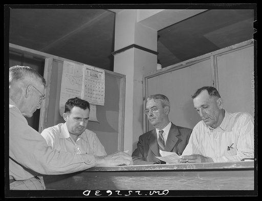 Untitled photo, possibly related to: San Augustine, Texas. A meeting of the rationing board
