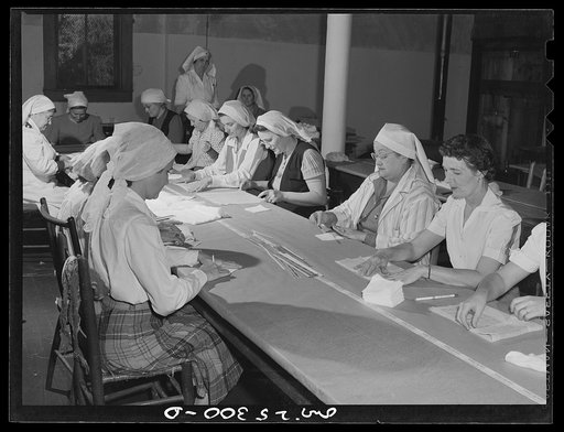 San Augustine, Texas. Women making surgical dressings for the Red Cross in the basement of the Masonic Temple
