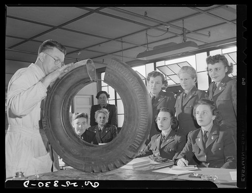 Holabird ordnance depot, Baltimore, Maryland. A group of WAACS (Women's Auxiliary Army Coprs) receive instruction in tire structure and care as part of the automotive preventive maintenance course which all Army men and women at Holabird must take. Instructor is H.T. McKinley of Baltimore, Maryland.