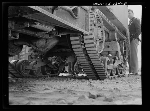 Holabird ordnance depot, Baltimore, Maryland. These rubber half-track treads cannot be recapped. Extreme care must therefore be taken to remove nails, glass and rocks from the grooves