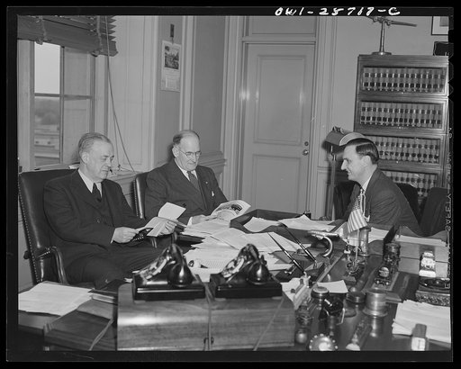 Washington, D.C. April 7, 1943. Joseph B. Eastman, director, Office of Defense Transportation (left); Charles S. Donley of Pittsburgh, Pennsylvania, immediate past president, Kiwanis International (center), and O.E. Peterson of Chicago, Illinois, secretary, Kiwanis International (right)