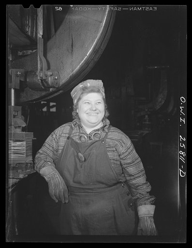 Buffalo, New York. Esther O'Hara, twenty-six, is a shearman's helper trimming defects from machine gun barrels at Republic Steel. She prefers her job to housework
