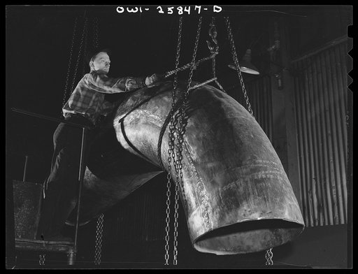 Bethlehem-Fairfield shipyards, Baltimore, Maryland. Lifting copper pipe