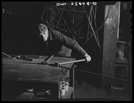 Bethlehem-Fairfield shipyards, Baltimore, Maryland. Bending master form for pipe installation