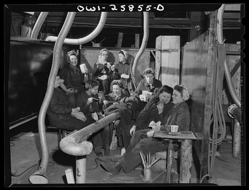 Bethlehem-Fairfield shipyards, Baltimore, Maryland. Women arc welders in the pipe shop during lunch hour