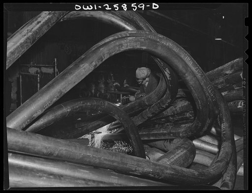 Bethlehem-Fairfield shipyards, Baltimore, Maryland. Welding at night