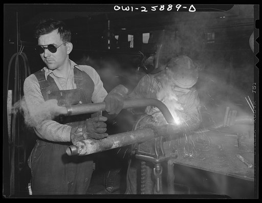 Bethlehem-Fairfield shipyards, Baltimore, Maryland. Welding bent pipe to pipe