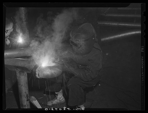 Bethlehem-Fairfield shipyards, Baltimore, Maryland. Welding in the pipe shop