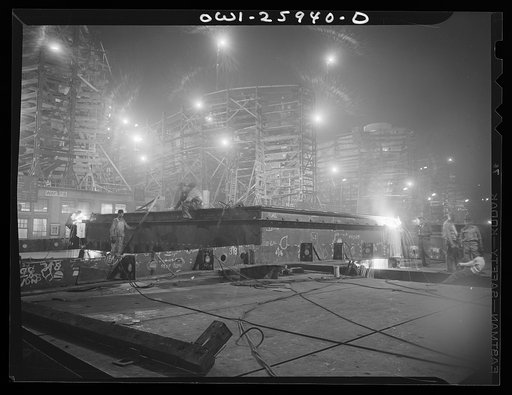 Bethlehem-Fairfield shipyards, Baltimore, Maryland. Welding in front of the shipways at night