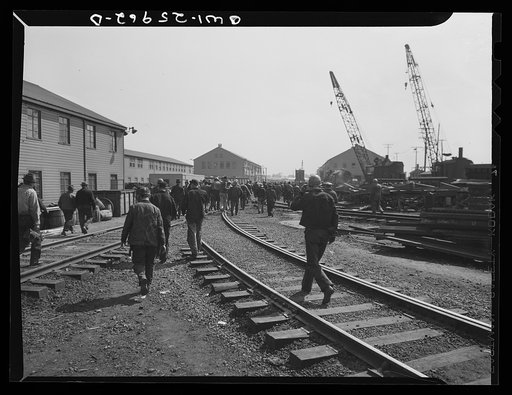 Bethlehem-Fairfield shipyards, Baltimore, Maryland. Workmen going home at the end of the 3:30 shift