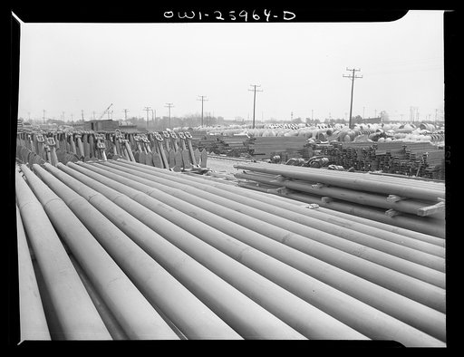 Bethlehem-Fairfield shipyards, Baltimore, Maryland. Masts stored in the yard