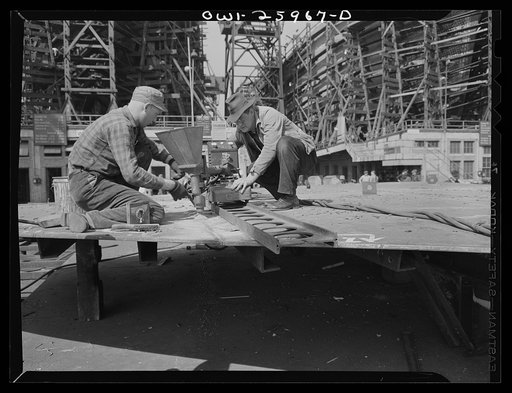 Bethlehem-Fairfield shipyards, Baltimore, Maryland. Making a weld with union welding machines