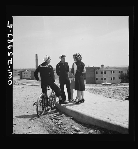 Untitled photo, possibly related to: Arlington, Virginia. Sailors bicycled over to Arlington Farms, a residence for women who work in the U.S. government for the duration of the war, from Washington in search of a date