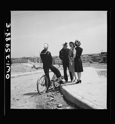Untitled photo, possibly related to: Arlington, Virginia. Sailors bicycled over to Arlington Farms, a residence for women who work in the U.S. government for the duration of the war, from Washington in search of a date