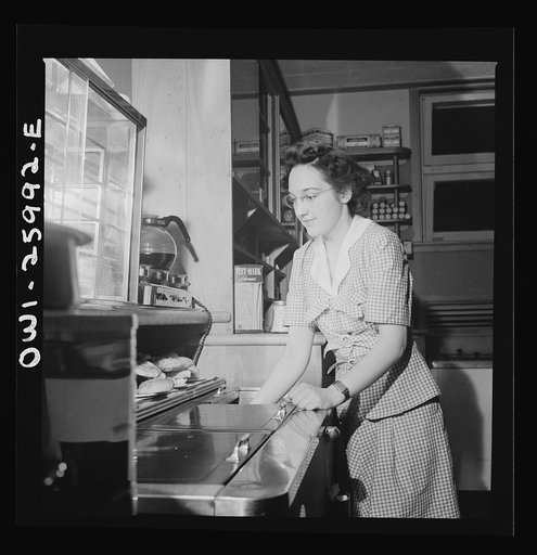 Arlington, Virginia. Girl getting food in the service shop at Idaho Hall, Arlington Farms, a residence for women who work in the U.S. government for the duration of the war. The shop help is run on a self-service basis