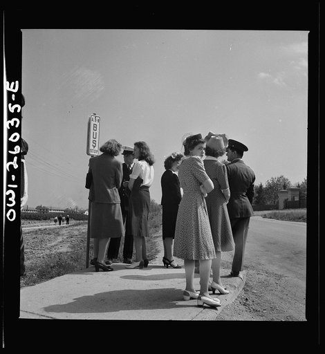 Arlington, Virginia. Waiting for the bus at Arlington Farms, a residence for women who work in the U.S. government for the duration of the war
