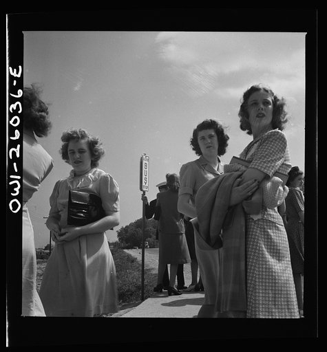 Arlington, Virginia. Waiting for the bus at Arlington Farms, a residence for women who work in the U.S. government for the duration of the war