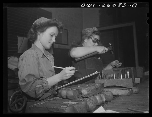 Untitled photo, possibly related to: Buffalo, New York. The metallurgical laboratory of Republic Steel entirely manned by women. Twenty-one year old Florence Bergtold is "boss" of one shift. Here steel samples are tested for tensil strength, hardenability, and density. Billet samples such as one bei