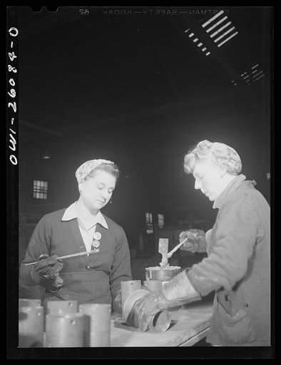 Buffalo, New York. Laura Czaya painting snubbers, a part of railroad car couplers at Symington-Gould. She is of Polish descent and formerly worked at Gould Battery. Previously she was forelady of a WPA (Work Projects Administration) sewing project. Her husband is in the Army