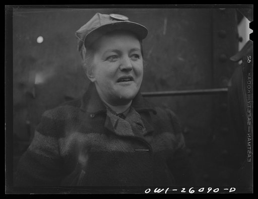 Untitled photo, possibly related to: Buffalo, New York. "Hookers" standing in front of gondola car in Republic Steel yard