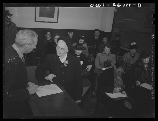 Buffalo, New York. People waiting to be interviewed at the employment agency of the Bell Aircraft plant. This woman is forty-five, and worked in a factory in the last war; has since been a housewife, and has two children over fourteen