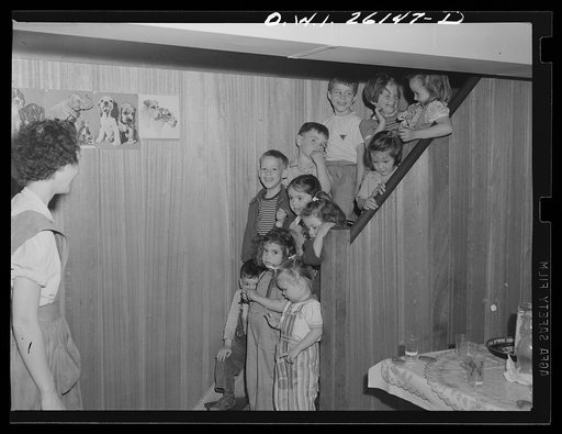 Washington, D.C. A day nursery for pre-school children of mothers engaged in war work, operated under the supervision of the District of Columbia Health Department by Mrs. Leroy Bonbrest, at her home at 1144 Branch Avenue, S.E. Children coming in to lunch