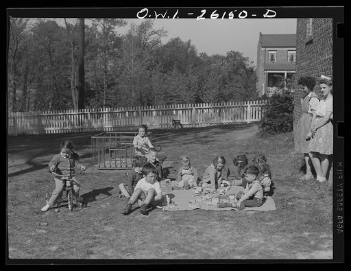 Washington, D.C. A day nursery for pre-school children of mothers engaged in war work, operated under the supervisor of the District of Columbia Health Department by Mrs. Leroy Bonbrest, at her home at 1144 Branch Avenue, S.E. Children playing in the yard