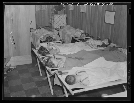 Washington, D.C. A day nursery for pre-school children of mothers engaged in war work, operated under the supervision of the District of Columbia Health Department by Mrs. Leroy Bonbrest, at her home at 1144 Branch Avenue, S.E. Rest period