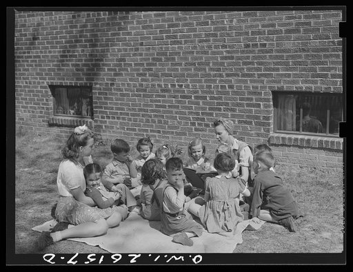 Untitled photo, possibly related to: Washington, D.C. A day nursery for pre-school children of mothers engaged in war work, operated under the supervision of the District of Columbia Health Department by Mrs. Leroy Bonbrest at her home at 1144 Branch Avenue, S.E. Mrs. Bonbrest and the children out i