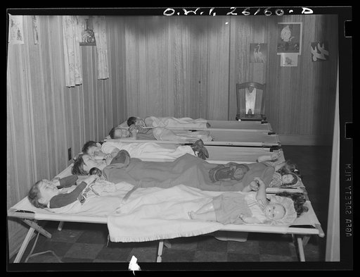Untitled photo, possibly related to: Washington, D.C. A day nursery for pre-school children of mothers engaged in war work, operated under the supervision of the District of Columbia Health Department by Mrs. Leroy Bonbrest, at her home at 1144 Branch Avenue, S.E. Rest period