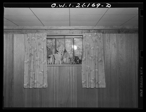 Untitled photo, possibly related to: Washington, D.C. A day nursery for pre-school children of mothers engaged in war work, operated under the supervision of the District of Columbia Health Department by Mrs. Leroy Bonbrest at her home at 1144 Branch Avenue, S.E. Looking in the window