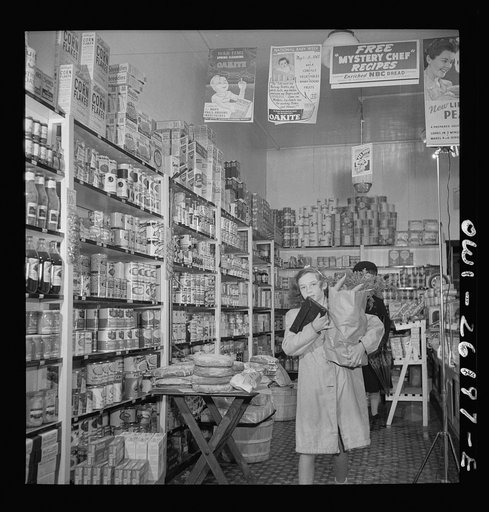 Buffalo, New York. Beverly Ann Grimm, eleven, leaving the store after making the family purchases from a list left that morning by her twenty-six year old widowed mother who is a crane operator at Pratt and Letchworth